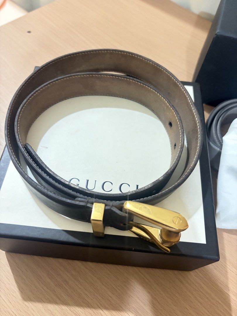 Gucci Bamboo Buckle Leather Belt (Category: Belts) located in Iloilo. Submitted by miafinds (Listing ID 1470386672, Image 2). Description: - Brand: Authentic Gucci - Color: Dark brown leather with tan interior lining - Hardware: Distinctive gold-tone bamboo-style metal buckle with engraved Gucci branding - Condition: Excellent, stored in original presentation box - Style: Versatile designer accessory perfect for everyday wear.