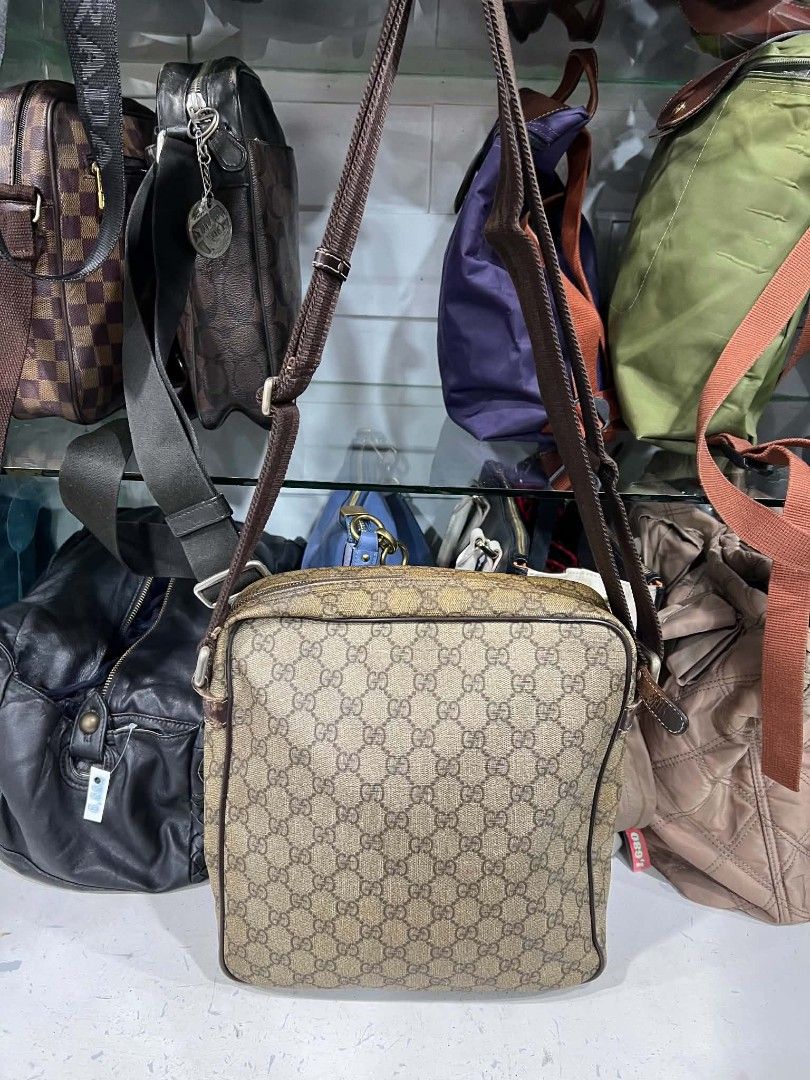 Gucci GG Supreme Messenger Bag 201448 (Category: Sling Bags) located in Urdaneta. Submitted by jayceegarage (Listing ID 1470501840, Image 2). Description: - Authentic Gucci messenger bag in classic GG Supreme canvas - Durable brown leather trim and adjustable fabric strap for shoulder or crossbody wear - Secure main zippered compartment and handy front zip pocket - Spacious interior for all your daily essentials - Serial number: 201448 506631 sta
