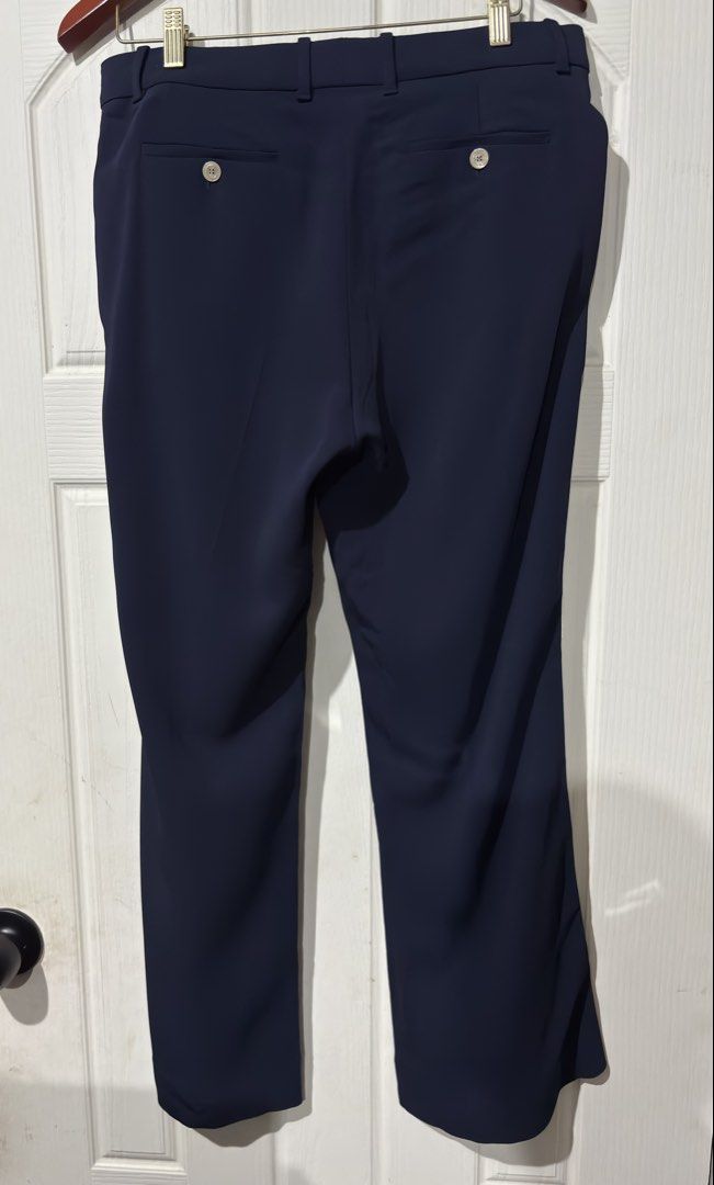 Gucci Navy Blue Trousers with Side Stripe (Category: Trousers) located in Taguig. Submitted by andalisnestor (Listing ID 1470469068, Image 3). Description: Gucci Trouser Pants 46 on tag 33 by inches waist 8,500php Good as new.