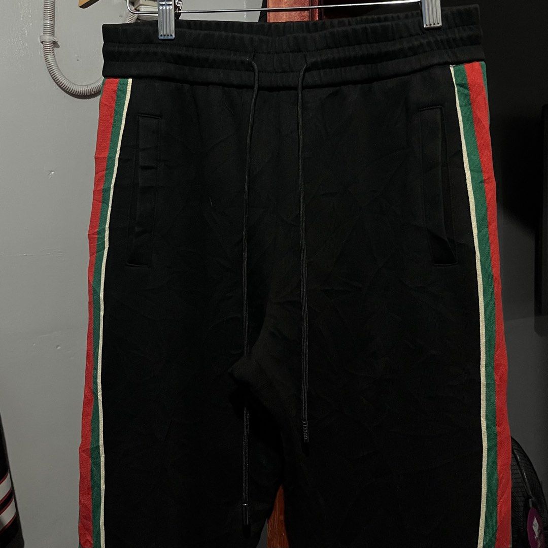 Gucci Web Stripe Snap On Track Sweatpants (Category: Luxury Apparel) located in Davao. Submitted by lwndvo (Listing ID 1470545546, Image 3). Description: Gucci Web Stripe Snap On Track Sweatpants Excellent UC Dimensions: Waist: 30-34 Length: 37 Hem: 7 Issue/s: None Price: 1,580 + shipping .
