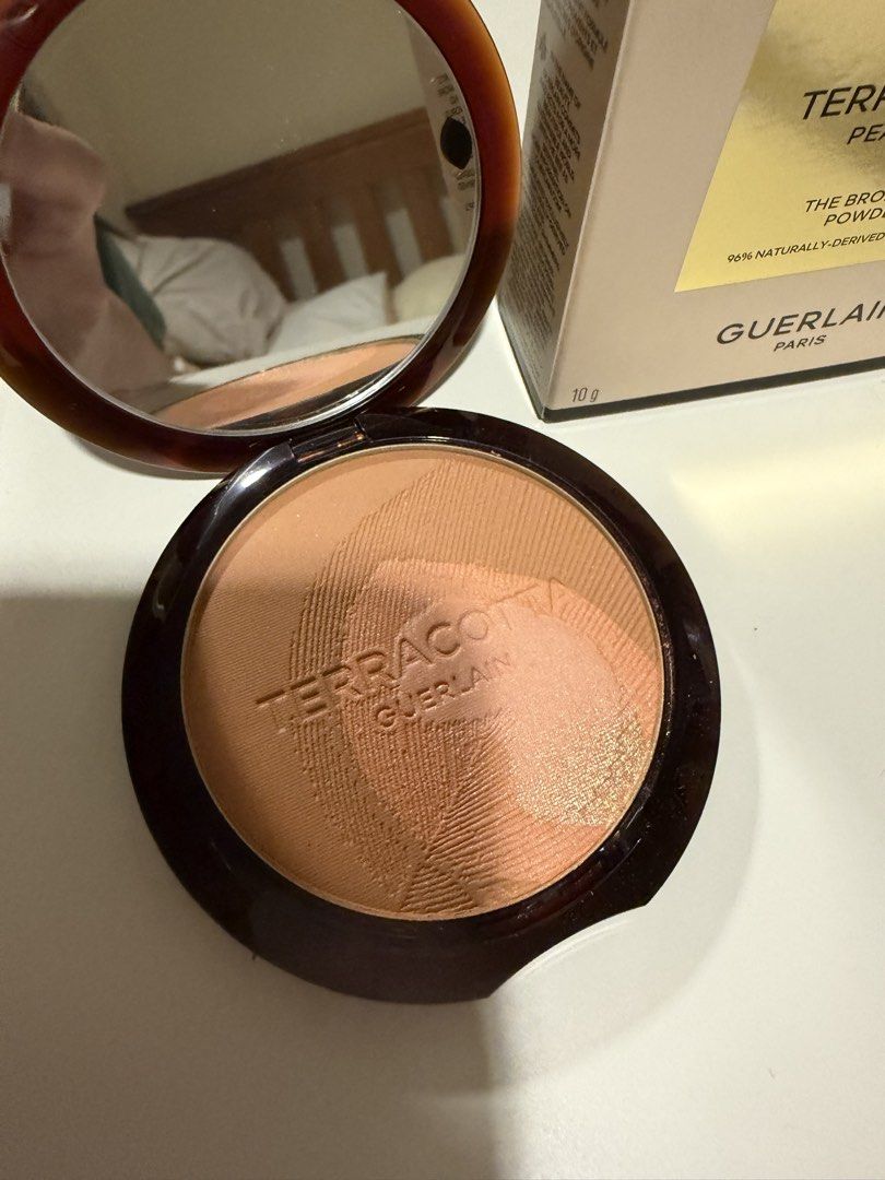 Guerlain Terracotta Peacock Bronzer Blush (Category: Makeup) located in Cavite. Submitted by ashhiiiii (Listing ID 1470521048, Image 2). Description: Bought at Guerlain Greenbelt gor 4,100 Used lightly twice .