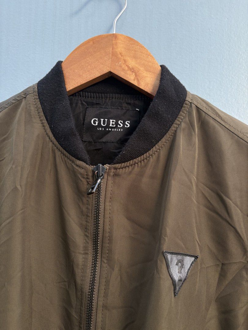 GUESS full-zip bomber jacket (Category: Coats, Jackets and Outerwear) located in General Santos City (Dadiangas). Submitted by a.rt.eyes (Listing ID 1470447257, Image 3). Description: GUESS full-zip bomber jacket Actual size medium Dimension width 19 length 28 Excellent condition with no issues Color rate 10/10 Original Located in General Santos City, Mindanao. Shipping fee applies for buyers outside my location. Payment first only no COP or COD.