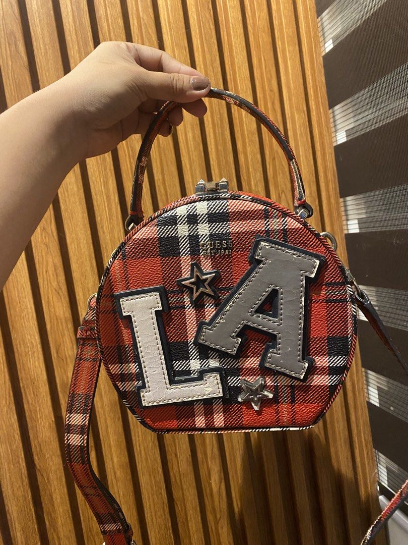 GUESS Lizzy Round Case Crossbody Bag (Category: Cross-body Bags) located in Binan City. Submitted by jjazrylle (Listing ID 1470540847, Image 1). Description: auth rare guess bag condition: 8/10 strap still included (no flaws) flaws were indicated in photos 600 + sf 📥.