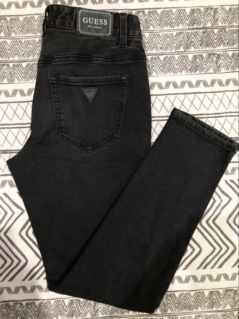 GUESS Mom Fit Jeans in authentic black (Category: Jeans) located in General Santos City (Dadiangas). Submitted by amorhesthrift (Listing ID 1470461464, Image 3). Description: GUESS Mom Fit Jeans featuring a high-rise waist and a relaxed straight-to-tapered leg Size-28 on tag stretchable W28-30 L36.