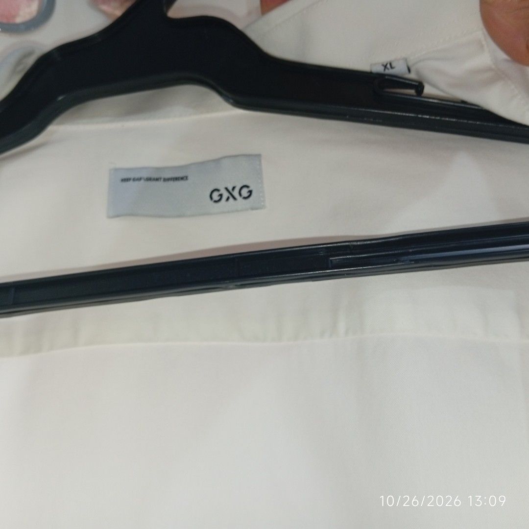 GXG White Long Sleeve Shirt (Category: Coats, Jackets and Outerwear) located in Taguig. Submitted by manilyn_lau (Listing ID 1470391212, Image 1). Description: - Brand: GXG - Size: XL - Material: 100% Cotton - Color: Solid white - Details: Contrast embroidery on collar points and small cursive text embroidery on left chest - Cuffs: Button cuffs - Condition: Excellent / Ready to wear.