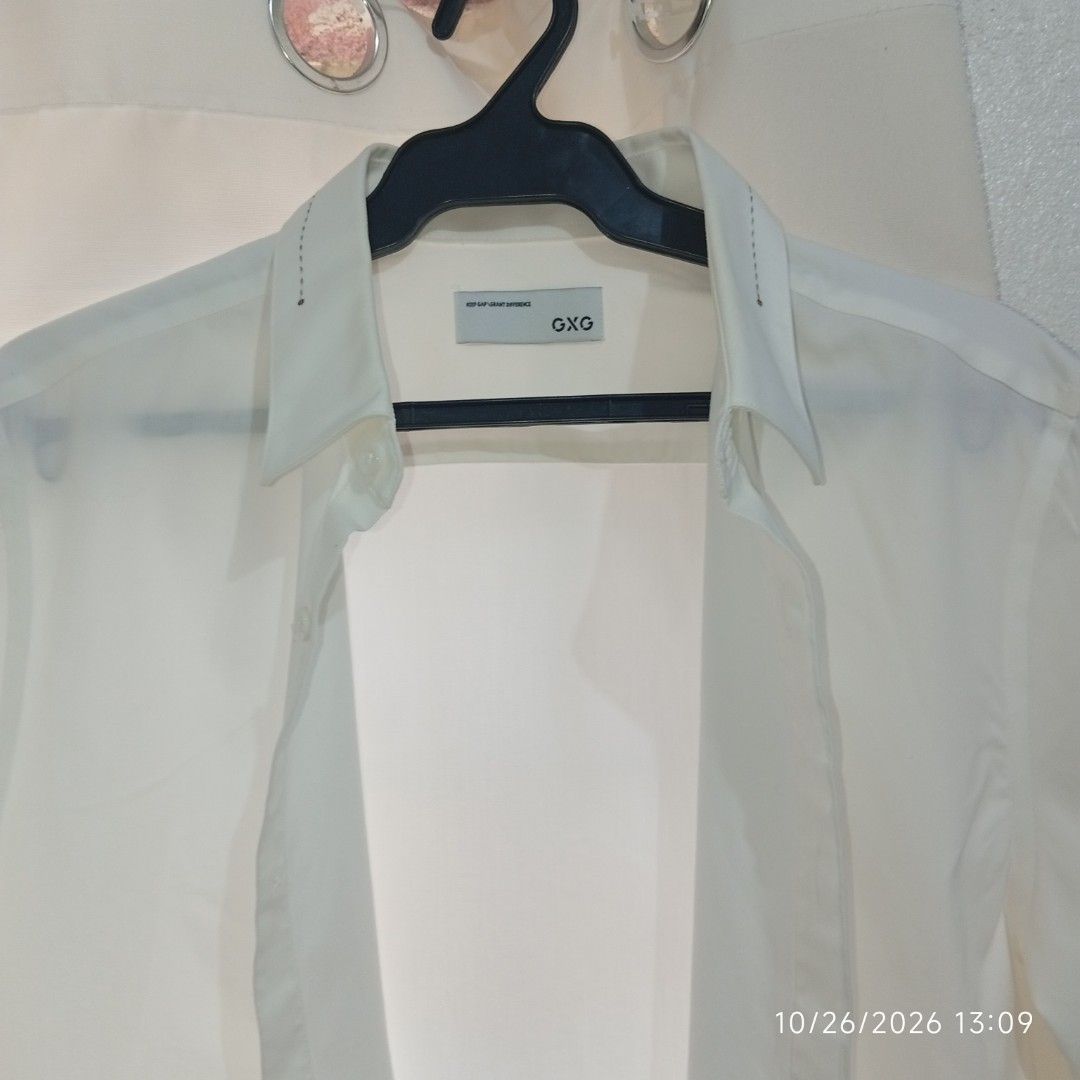 GXG White Long Sleeve Shirt (Category: Coats, Jackets and Outerwear) located in Taguig. Submitted by manilyn_lau (Listing ID 1470391212, Image 2). Description: - Brand: GXG - Size: XL - Material: 100% Cotton - Color: Solid white - Details: Contrast embroidery on collar points and small cursive text embroidery on left chest - Cuffs: Button cuffs - Condition: Excellent / Ready to wear.