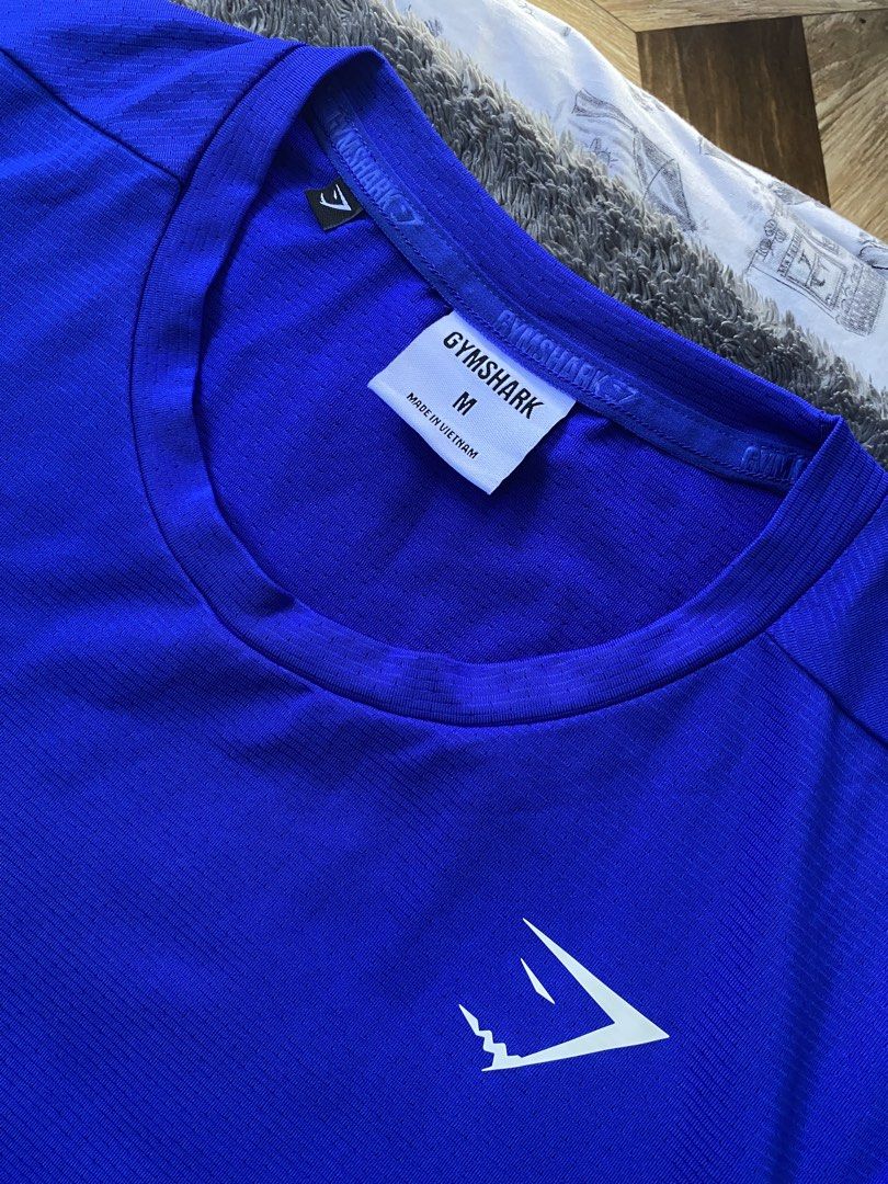 Gymshark Arrival Shirt (Category: Activewear) located in Cebu City. Submitted by markvoid (Listing ID 1470493377, Image 2). Description: Gymshark Arrival Shirt >Excellent Condition >Like New >No Flows >Color Rate: 10/10 >Color May Vary Due To Light >Width: 19.5 >length: 28 >Size: Medium >Price+SF >MOP: Gcash/Bank Transfer >Shipping: J&T Mandaue City.