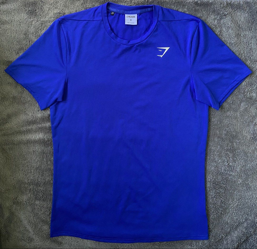 Gymshark Arrival Shirt (Category: Activewear) located in Cebu City. Submitted by markvoid (Listing ID 1470493377, Image 1). Description: Gymshark Arrival Shirt >Excellent Condition >Like New >No Flows >Color Rate: 10/10 >Color May Vary Due To Light >Width: 19.5 >length: 28 >Size: Medium >Price+SF >MOP: Gcash/Bank Transfer >Shipping: J&T Mandaue City.