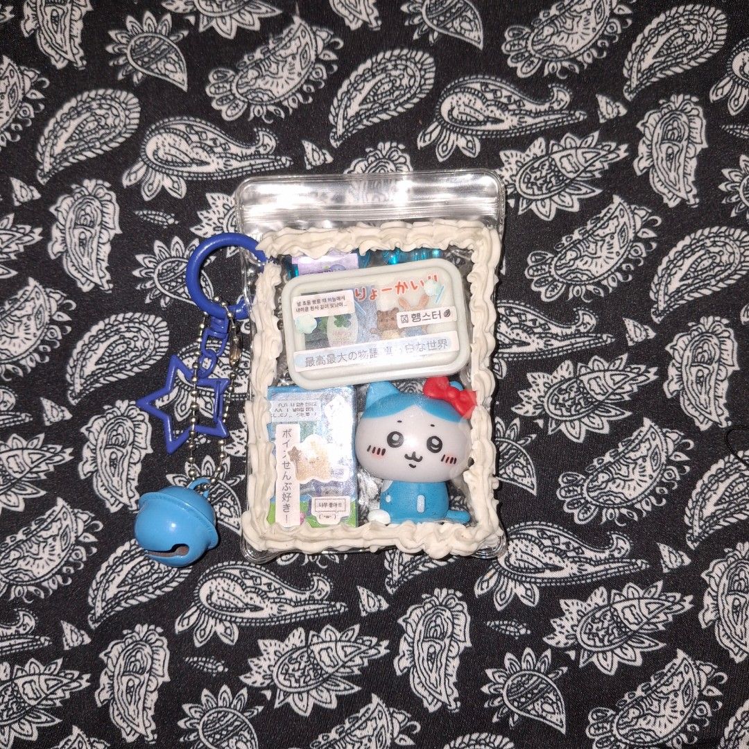 hachiware trinket keychain (Category: Character Goods) located in Manila. Submitted by rmmmko (Listing ID 1470461974, Image 1). Description: 🧴: Hachiware, capsule toy (gachapon) stuffed pouch 🧴: Chiikawa × Sanrio Characters Narikiri Figure capsule toy series (gashapon) 🧴: arranged a collection of blue-themed items 🧴: check each image 🧴: Decluttering stuff I don't have any interest it 🧴: Everything is sold as is and as pictured 🧴: Message m