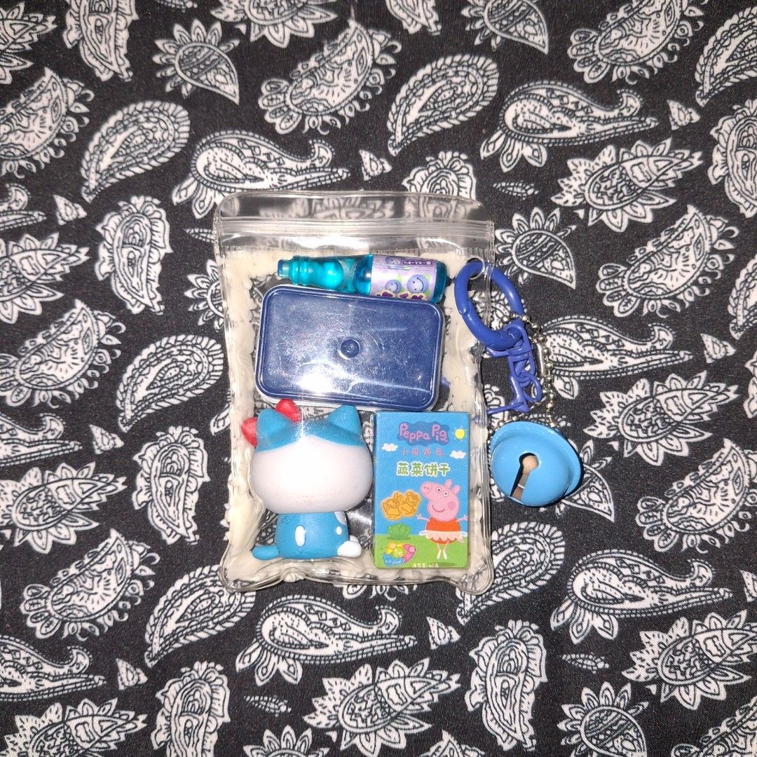 hachiware trinket keychain (Category: Character Goods) located in Manila. Submitted by rmmmko (Listing ID 1470461974, Image 2). Description: 🧴: Hachiware, capsule toy (gachapon) stuffed pouch 🧴: Chiikawa × Sanrio Characters Narikiri Figure capsule toy series (gashapon) 🧴: arranged a collection of blue-themed items 🧴: check each image 🧴: Decluttering stuff I don't have any interest it 🧴: Everything is sold as is and as pictured 🧴: Message m