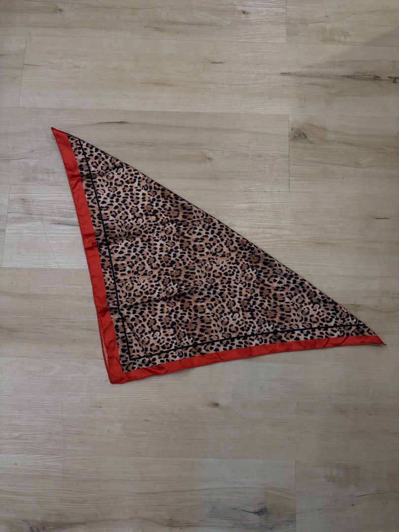 hailey bieber leopard silk scarf with red details (Category: Scarves) located in Manila. Submitted by _____car0usell (Listing ID 1470496127, Image 3). Description: - wear as a headscarf (hailey bieber style), neck scarf, or tie it to your handbag handle - never used, just for fitting.