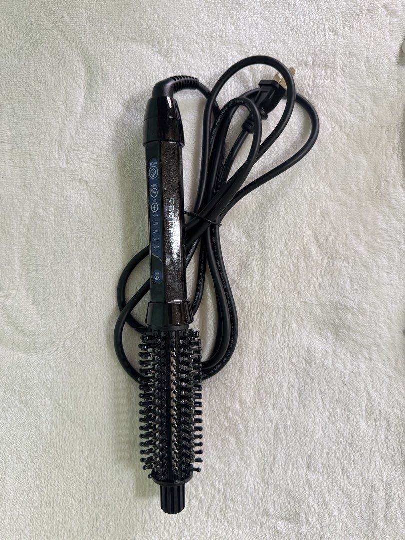 Hair Styling Tools (Category: Hair) located in Manila. Submitted by mmilaomls (Listing ID 1470405157, Image 2). Description: - 2-in-1 Hair Styling Bundle: Get both straight and curly looks effortlessly - Black 26mm Heating Brush: Features digital temperature controls up to 230°C for fast straightening - White & Pink Automatic Curler: Creates perfect, hassle-free curls every time - Ready to Use: Both units come with attached power cords and plugs 