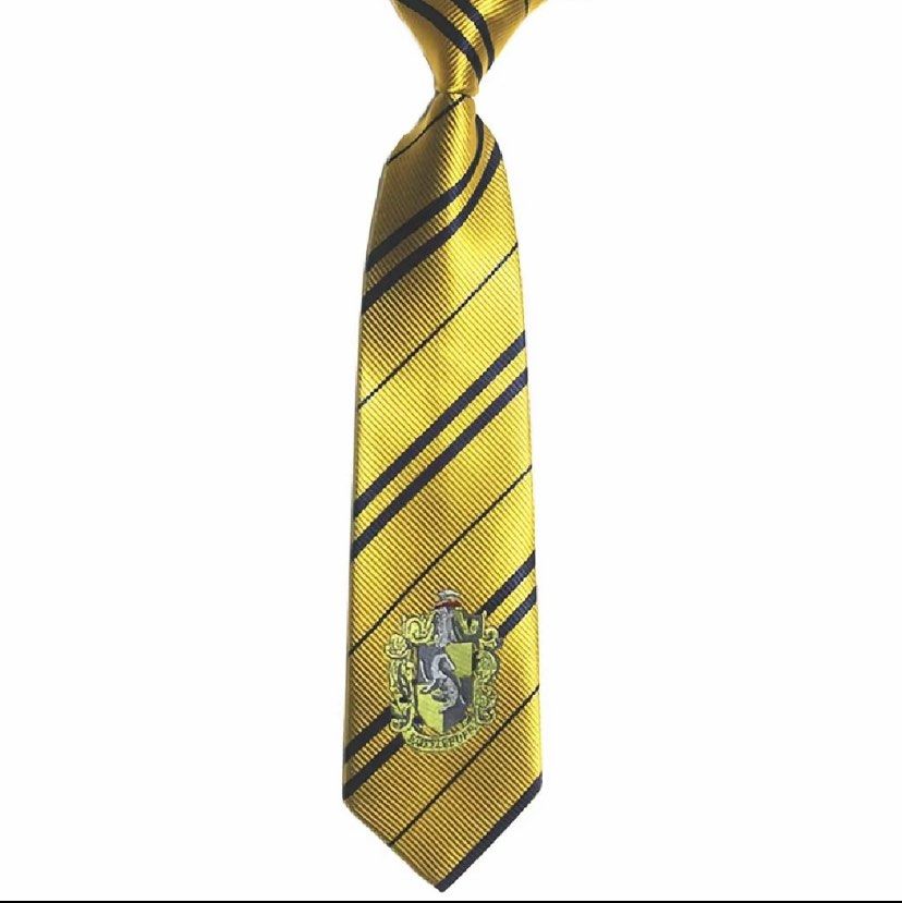 Harry Potter Hufflepuff Tie (Category: Other Accessories) located in Manila. Submitted by jstrandom (Listing ID 1470535426, Image 1). Description: - Size: Standard width and length - Condition: Excellent, worn only once, - Perfect for: Cosplay, Halloween costumes, and Harry Potter themed parties.