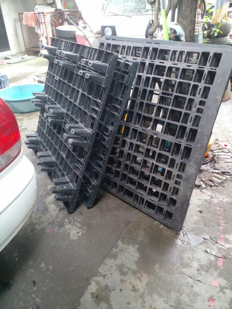 Heavy-Duty Black Plastic Pallets Industrial Storage (Category: Construction & Building Materials) located in Manila. Submitted by wisegem-231b (Listing ID 1470450894, Image 1). Description: - Heavy-duty black plastic pallets ideal for warehouse storage and shipping - Strong grid design underneath provides reliable weight support for heavy loads - Standard sizing fits most operational needs - Sturdy and durable construction built to last - Note: D