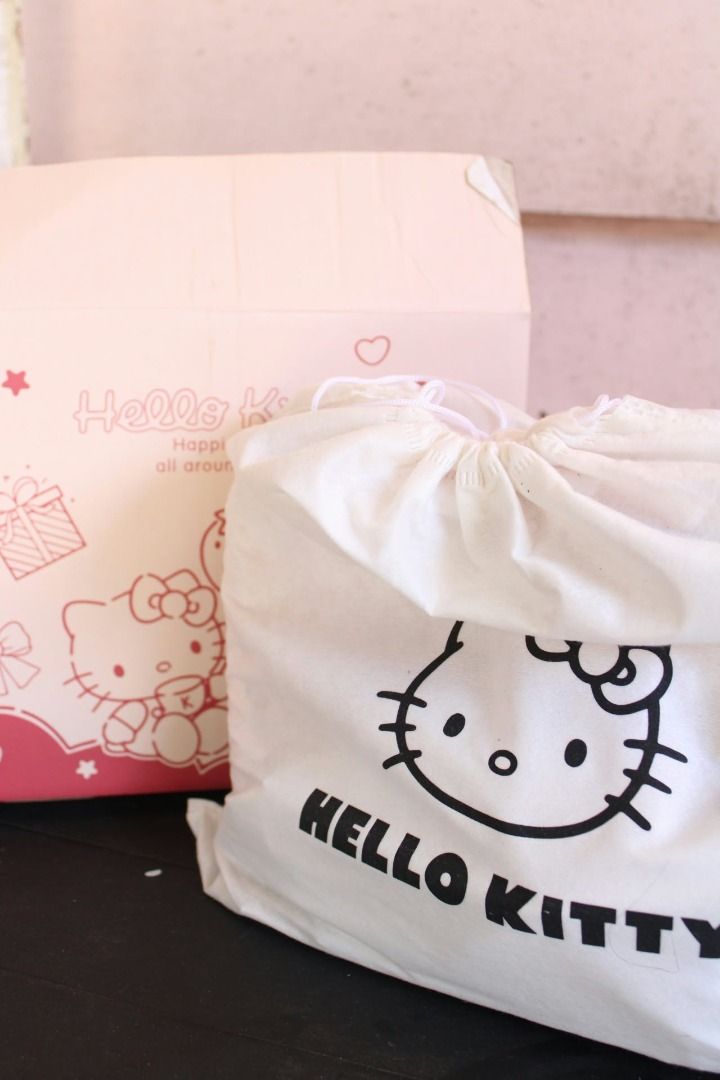HELLO KITTY SLING BAG (Category: Cross-body Bags) located in Plaridel. Submitted by tteokiemoi (Listing ID 1470411778, Image 2). Description: 🎀 FOR SALE: ORIGINAL HELLO KITTY SLING BAG 🎀 ₱700 ONLY! 🩷✨ 🎁 Brand new with box & dust bag 💗 Bought for ₱1,000 💸 Selling for only ₱700— save ₱300! RFS:Decluttering.