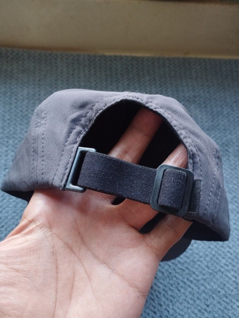 Helly Hansen Grey Athletic Cap (Category: Caps & Hats) located in Manila. Submitted by happycaps (Listing ID 1470408626, Image 3). Description: - Brand: Helly Hansen Packable Trail/Running Cap - Color: Dark Grey - Design: Classic 5-panel with rubberized HH front log - Fit: Adjustable elastic strap closure for a custom fit - Comfort: Textured inner lining for enhanced breathability - Ideal for: Outdoor activities, workouts, and casual wear .