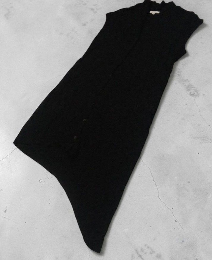 Helmut Lang - Button Down - Assymetrical Sleeveless - Dress (Category: Sleeveless) located in Manila. Submitted by grmnts_frmthe_slmz (Listing ID 1470392896, Image 3). Description: Helmut Lang sleeveless top in black. Front button closure running down the length. Unique asymmetric hemline hanging lower on one side. Lightweight knit material. Minimalist design Helmut Lang - Button Down - Assymetrical Sleeveless - Dress Dimes: 18.5 inches, Wdth 18 