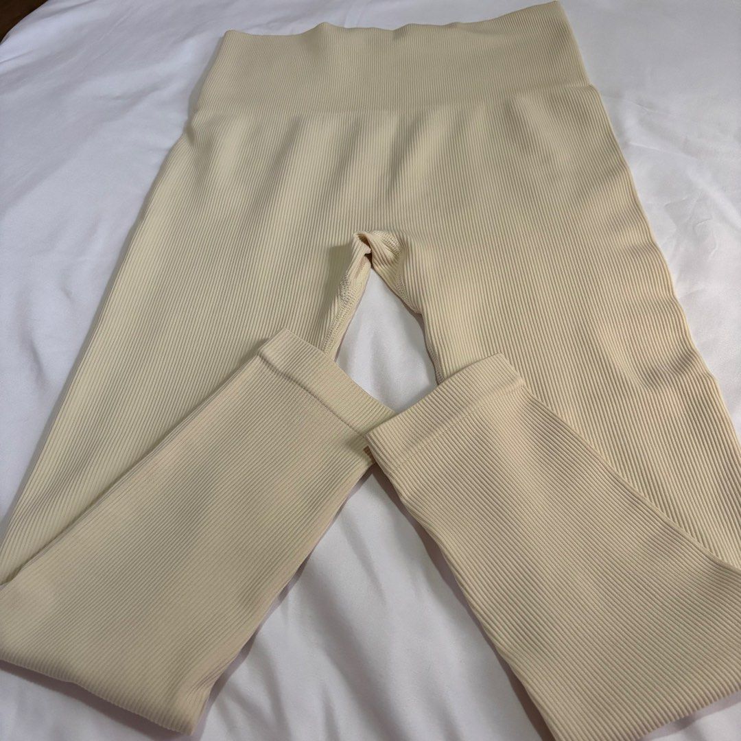High-Waist Workout Leggings Bundle - 4 Pairs (Category: Activewear) located in Bacoor. Submitted by jlistsshop2020 (Listing ID 1470485860, Image 3). Description: - Bundle of 4 high-waisted seamless workout leggings - Includes 4 pairs: Ombre black-to-beige with mesh hems, ombre black-to-green, solid cream ribbed, and solid taupe ribbed - Super stretchy, 100% squat-proof fabric - Supportive high waistband that stays put - Perfect for gym sessions, 