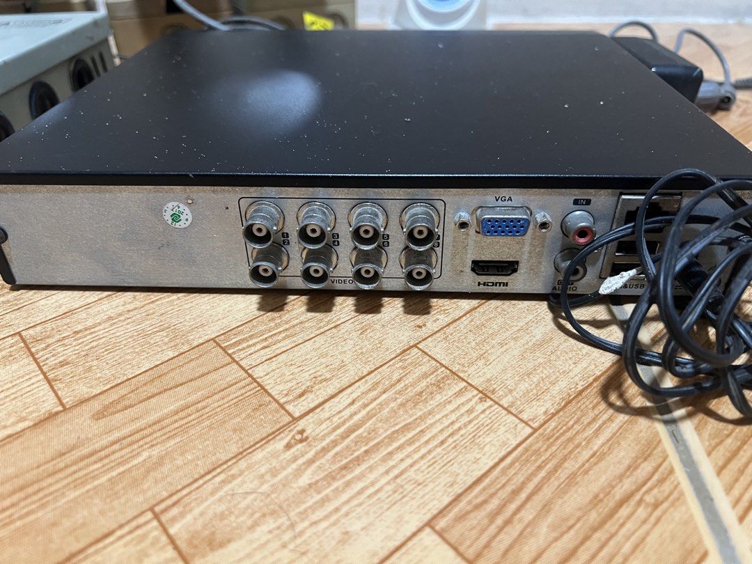 Hikvision DVR with Security Cameras and Power Supply Box (Category: Security Systems & CCTV Cameras) located in Malabon City. Submitted by demenice (Listing ID 1470392025, Image 3). Description: - Complete Hikvision DVR security system - Includes 4 bullet-style cameras and 1 dome camera - Comes with a metal power supply box (with key) and necessary cables - Tested and fully working - Shows minor cosmetic wear and dust from previous use - Ideal an