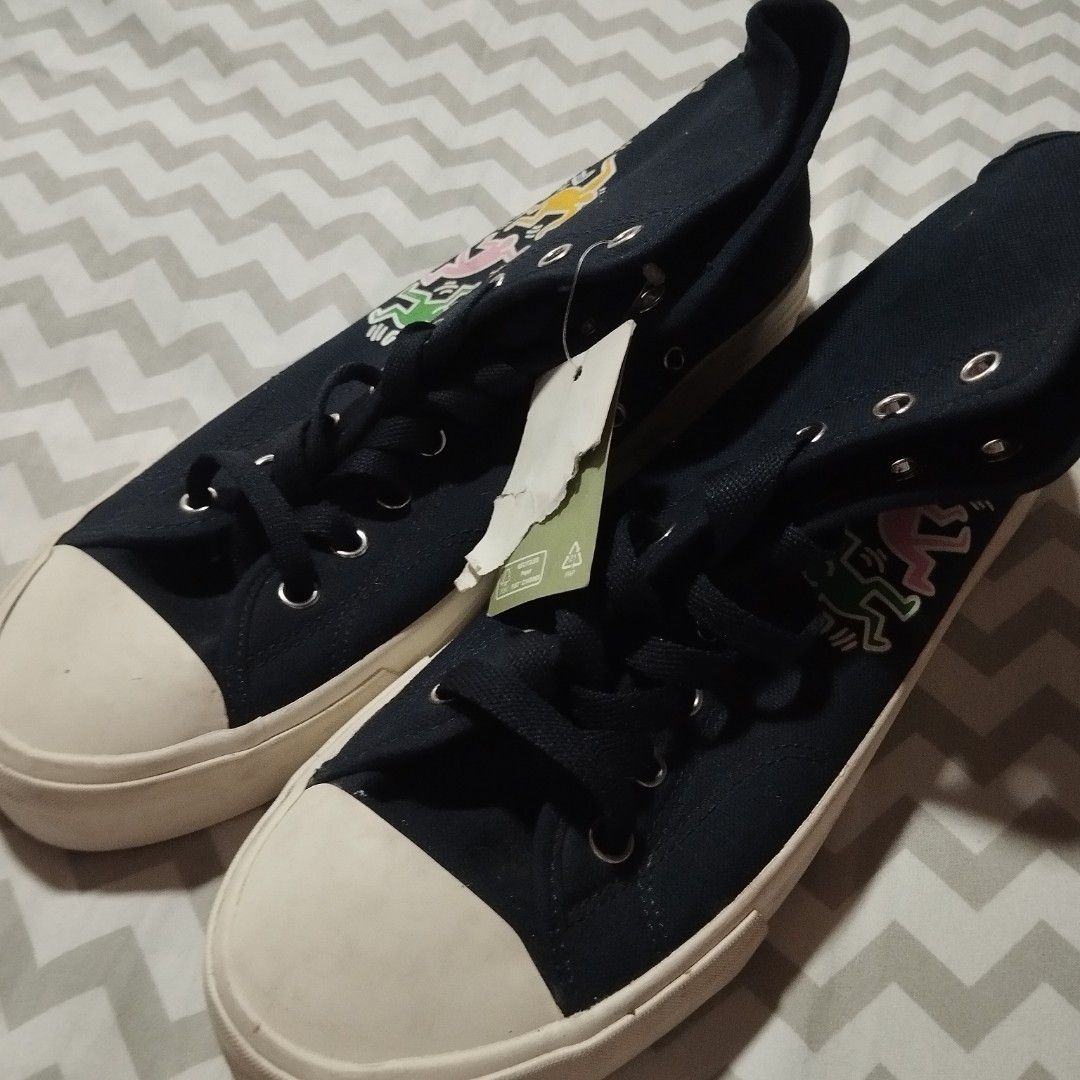 H&M Keith Haring High Top Sneakers (Category: Sneakers) located in Manila. Submitted by lene48 (Listing ID 1470349626, Image 1). Description: - Brand: Keith Haring Collection - Style: Dark blue high top canvas sneakers with colorful graphic prints - Condition: Brand new with original retail tag attached ($34.99) - Size: US 8.5 / EUR 41 - Details: Classic white rubber toe cap, thick sole, and signature Keith Haring logo tag on the heel, size 10 wo
