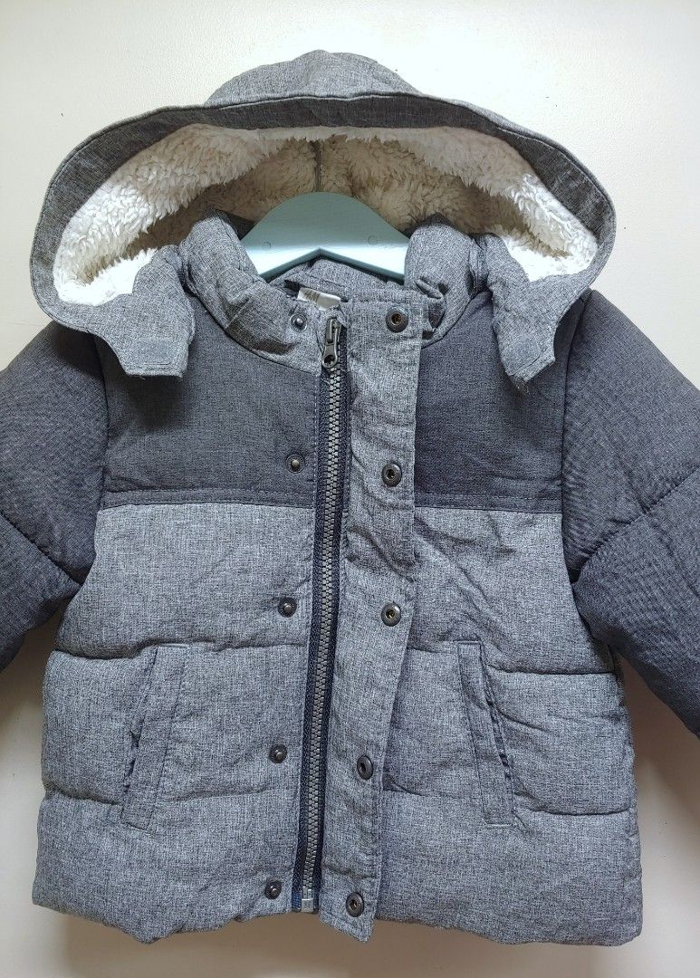 H&M Kids Winter Jacket 1.5-2 Years (Category: Babies & Kids Fashion) located in Dagupan City. Submitted by upforgrabs2400 (Listing ID 1470496956, Image 3). Description: H&M Kids Winter Jacket - Fits toddlers 1.5 to 2 years old - Measurements: Shoulders 12", Chest 13.5", Length 15" - Color: Stylish grey colorblock - Lining: Cozy fleece lining inside and on the hood for extra warmth - Closure: Full zip with front snap buttons - Pockets: Two handy f