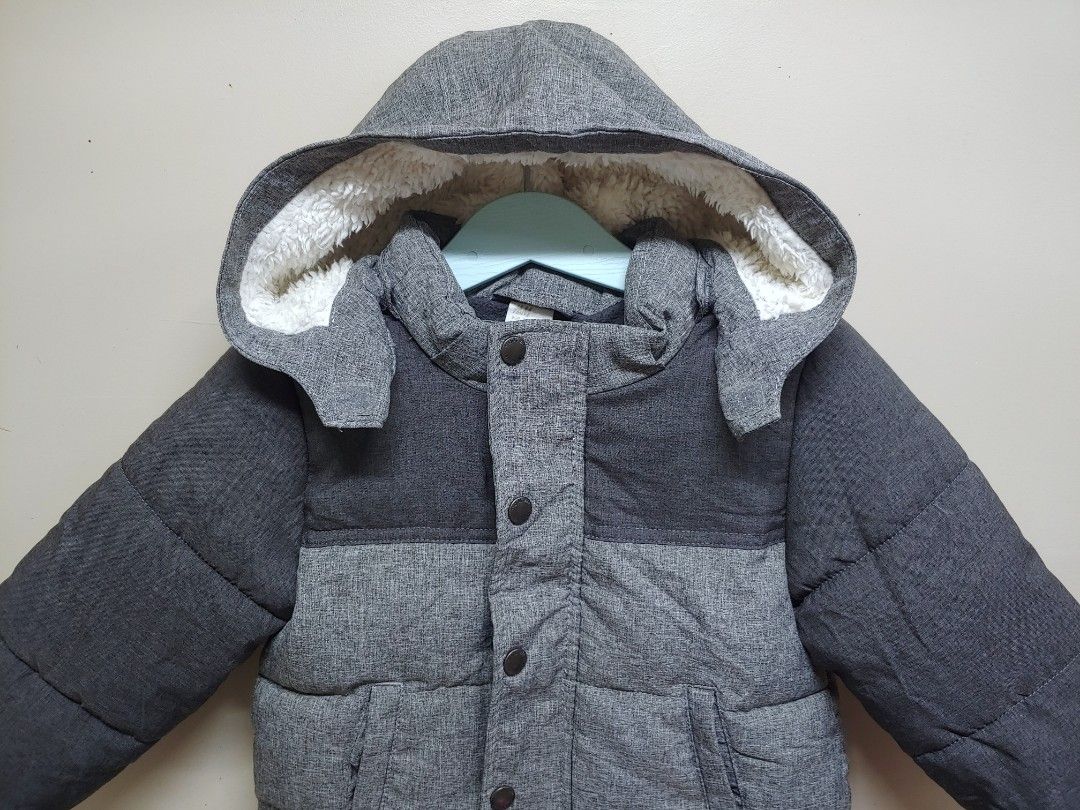 H&M Kids Winter Jacket 1.5-2 Years (Category: Babies & Kids Fashion) located in Dagupan City. Submitted by upforgrabs2400 (Listing ID 1470496956, Image 2). Description: H&M Kids Winter Jacket - Fits toddlers 1.5 to 2 years old - Measurements: Shoulders 12", Chest 13.5", Length 15" - Color: Stylish grey colorblock - Lining: Cozy fleece lining inside and on the hood for extra warmth - Closure: Full zip with front snap buttons - Pockets: Two handy f