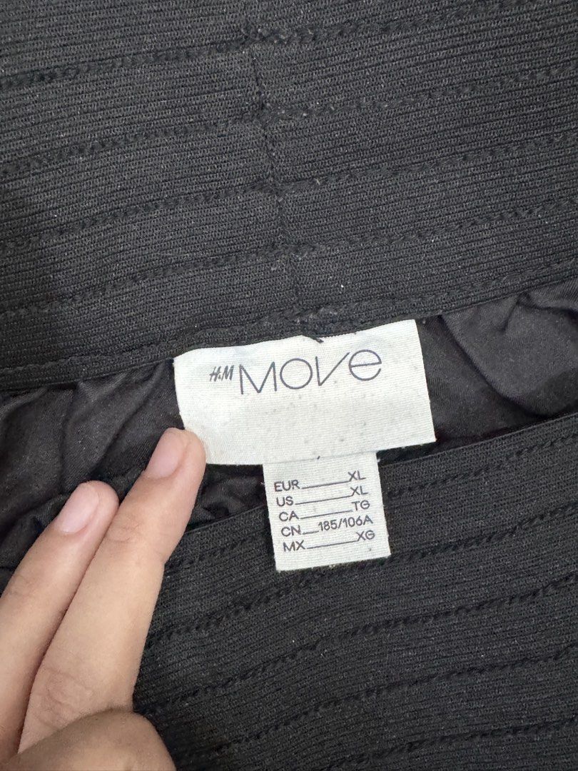 H&M Move Black Athletic Shorts XL (Category: Shorts) located in Valenzuela. Submitted by crabncorn (Listing ID 1470352024, Image 3). Description: - Brand: H&M Move - Color: Black - Size: XL (Standard men's sizing) - Material: Lightweight fabric - Features: Elastic waistband with printed logo detail on the back - Condition: Clean inside and out, ready for quick shipping - Ideal for: Workouts, sports, or casual lounging.