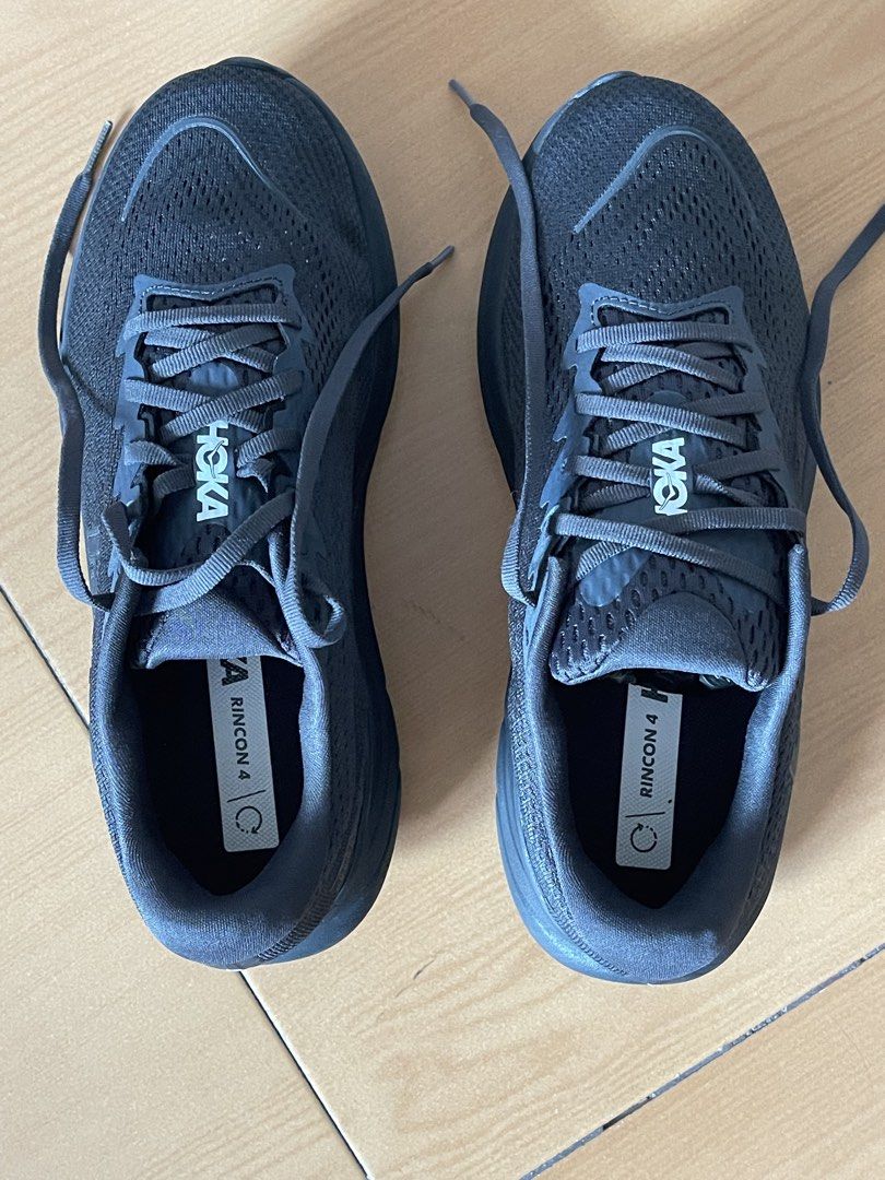 Hoka Rincon 4 Black Running Shoes (Category: Sneakers) located in Quezon City. Submitted by kvrt0907 (Listing ID 1470353996, Image 1). Description: - Brand: Hoka - Model: Rincon 4 - Color: Triple Black -Size: US 8.5 2E(wide size) - Condition: Excellent, zero wear on outsoles - Features: Super lightweight, thick cushioned foam sole, breathable mesh upper - Versatility: Ideal for road running, gym sessions, and daily walking Maganda siya kasi pwede