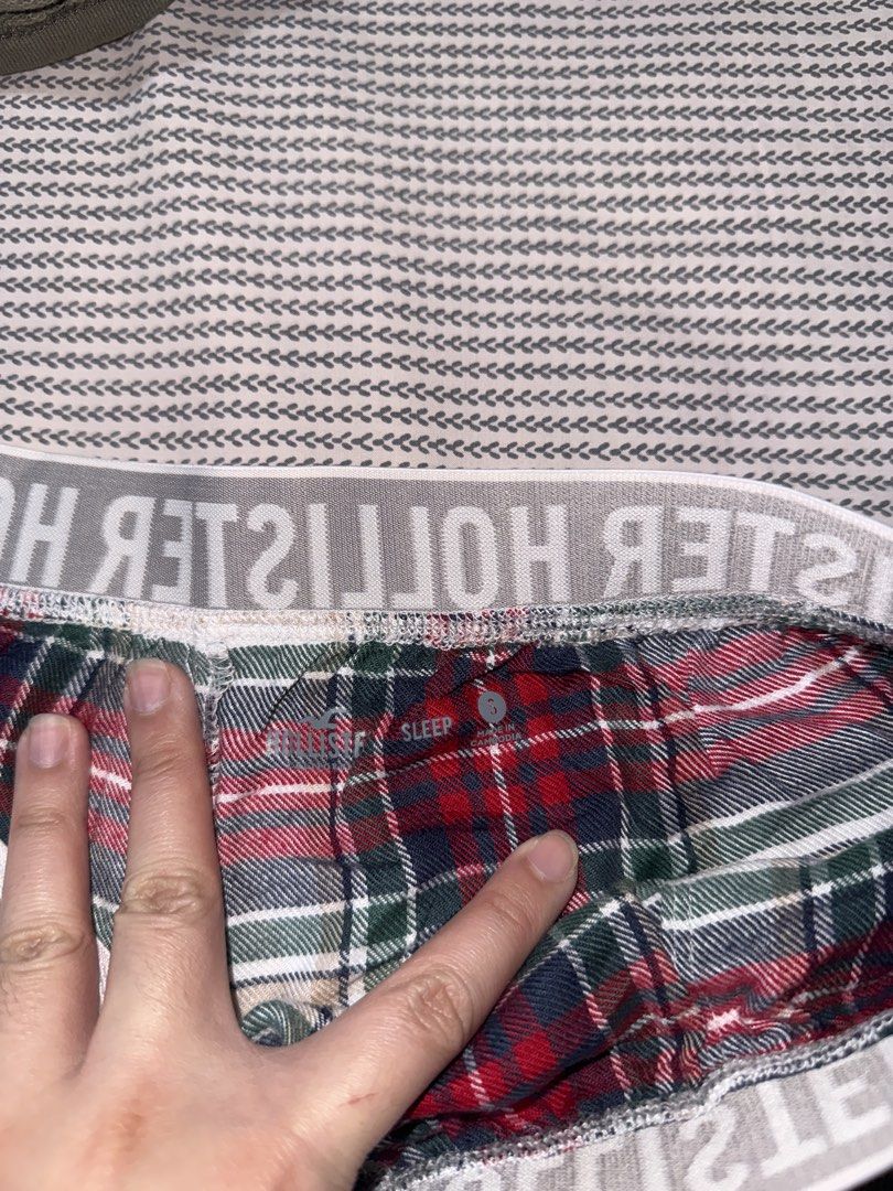 Hollister Plaid Sleep Shorts (Category: Shorts) located in Santa Ana. Submitted by fatikilla (Listing ID 1470378559, Image 2). Description: - Brand: Hollister - Item: Plaid Sleep Shorts - Size: Small - Color/Pattern: Red, green, white, and navy tartan - Features: Super soft fabric, comfortable elastic logo waistband - Condition: Brand new / Excellent - Made in: Cambodia.