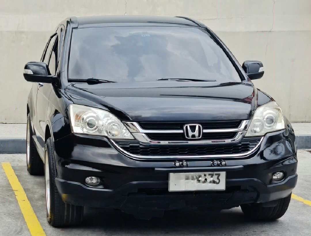 Honda CR-V 2.4 (A) (Category: Used Cars) located in Manila. Submitted by oddcrystal_43cdc4 (Listing ID 1470400398, Image 2). Description: 2010 Honda crv 2.4 four wheeldrive Autofold side mirror Shiny paint Orig paint No bannga/ not flooded Walang sakit sa ulo Ready for long drive Clean papers 18 mags thick tires No leaks Ice cold ac.