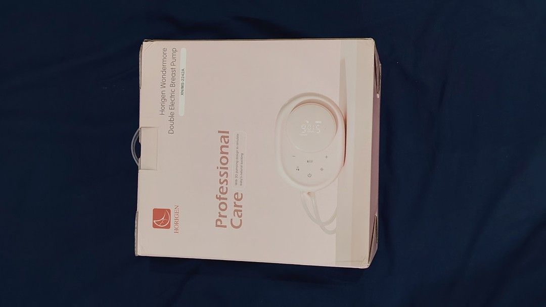 Horigen Wondermore Double Electric Breast Pump (Category: Breastfeeding & Bottle Feeding) located in Marikina City. Submitted by sophiagee17 (Listing ID 1470438773, Image 2). Description: - Brand: Horigen Wondermore Double Electric Breast Pump - Color: Pink - Condition: lightly used - RFS: no longer using - Inclusions: Complete with dual pumping kits, extra flange, and bottles .