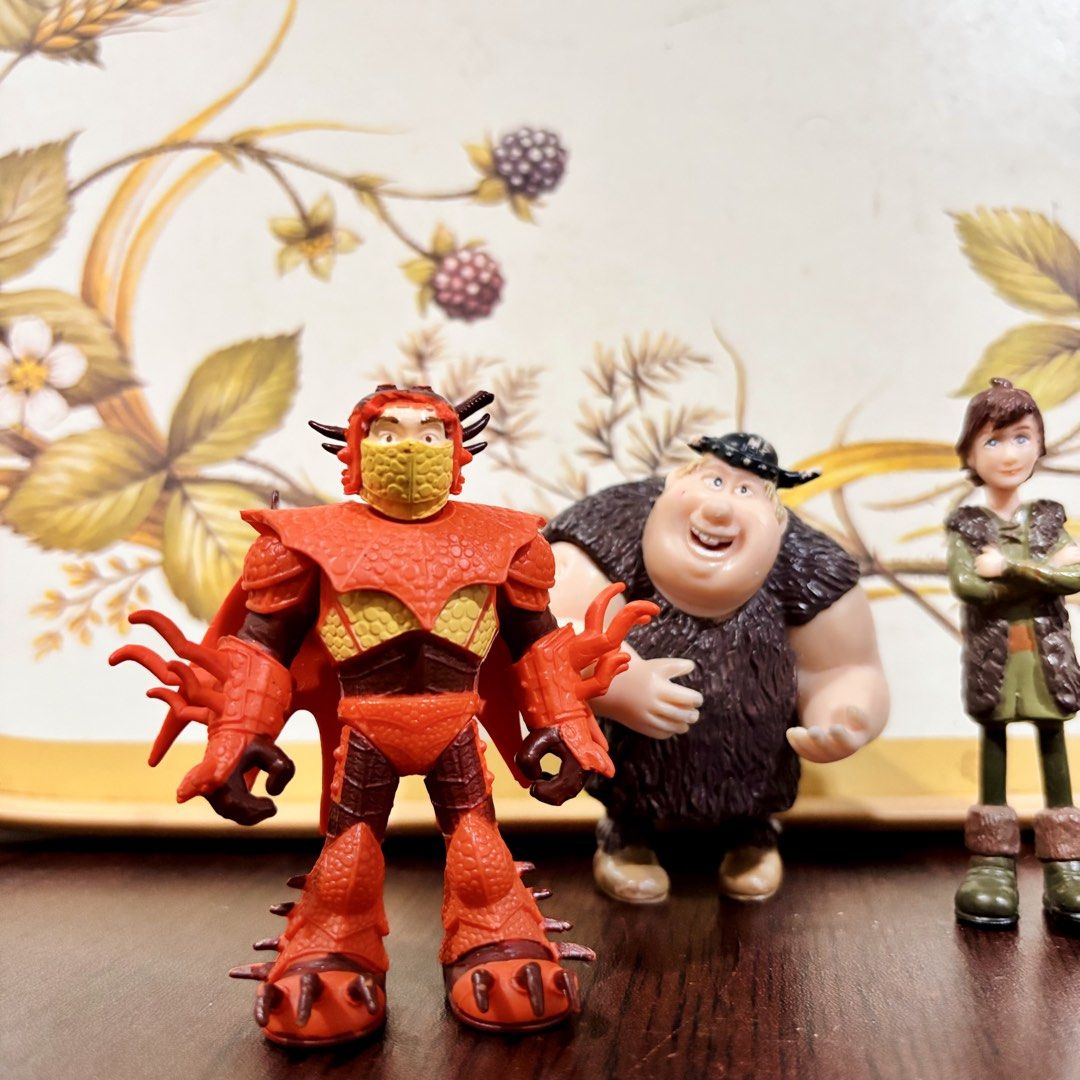 How to Train Your Dragon action figures set (Category: Figurines & Statues) located in Taguig. Submitted by sunnyplaythingsph (Listing ID 1470508202, Image 2). Description: - Set of 3 How to Train Your Dragon action figures - Includes Hiccup in green tunic, Fishlegs with winged helmet, and a warrior in red dragon scale armor - Detailed armor design and facial features - Stands upright on flat surfaces - Great collectibles for movie and series fan