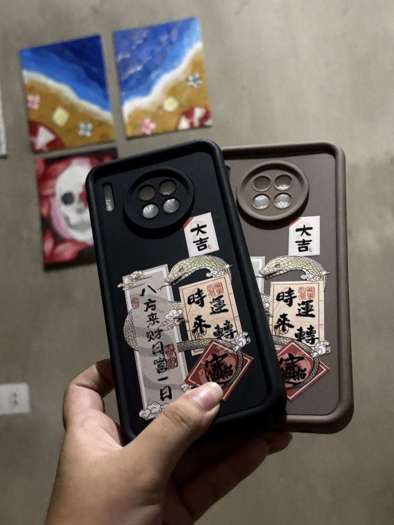 Huawei mate 30 case (Category: Cases & Sleeves) located in Manila. Submitted by royalpengwen (Listing ID 1470441104, Image 1). Description: - Compatible Model: Huawei Mate 30 - Design: Unique Japanese serpent and kanji artwork with raised camera protection - Colors Available: Matte Black and Brown - Condition: Good, well-maintained - Delivery Options: Shipping via J&T and LBC, or meetups at Mercury Drug Sum-ag, Sum-ag Public Market, and Bangga Nu