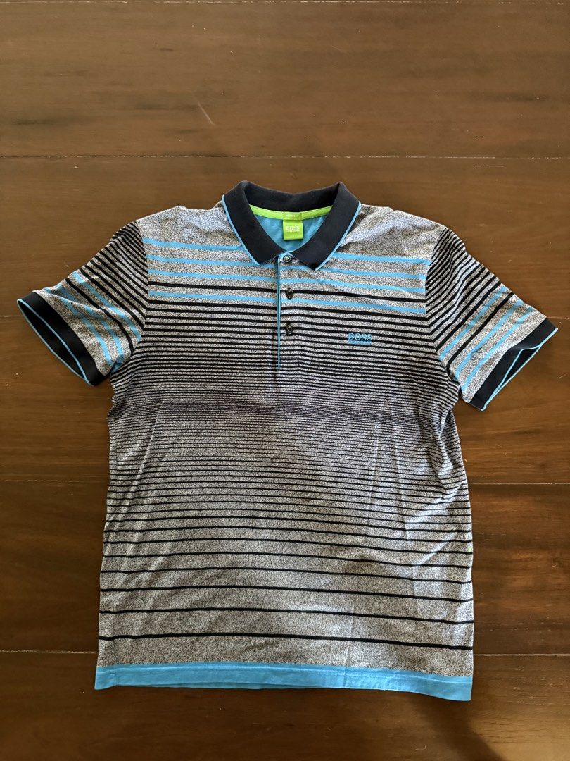 Hugo Boss Polo Shirt (Category: Tshirts & Polo Shirts ) located in Angeles City. Submitted by gillian_a (Listing ID 1470418915, Image 1). Description: Color: Grey with blue stripes Size: L (Modern Fit) No defects Check photos for dimensions/measurements.