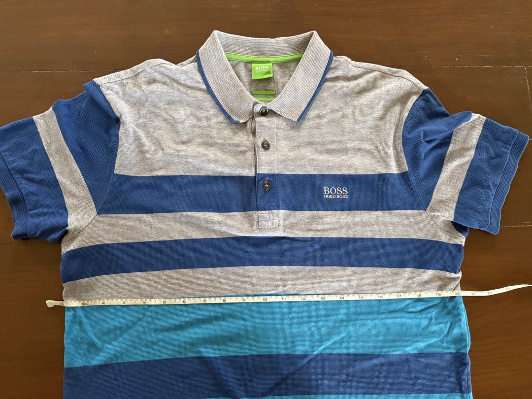 Hugo Bosss Polo Shirt (Category: Tshirts & Polo Shirts ) located in Angeles City. Submitted by gillian_a (Listing ID 1470419942, Image 3). Description: Color: Blue with Grey stripes Size: M (modern Fit) No defects Check photos for dimensions/measurements.