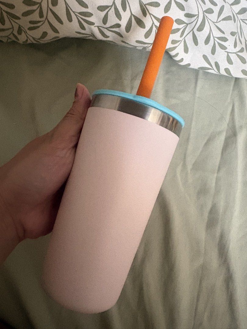Hydro Flask Tumbler (Category: Water Bottles & Tumblers) located in Manila. Submitted by mndoxajc (Listing ID 1470385865, Image 2). Description: - Color: Pink body with a contrasting light blue lid and orange straw - Temperature Control: Keeps drinks cold for hours all day long - Design: Features the classic Hydro Flask logo near the bottom and a clean stainless steel rim - Versatile Use: Great size for daily commutes, workouts, or desk hydration