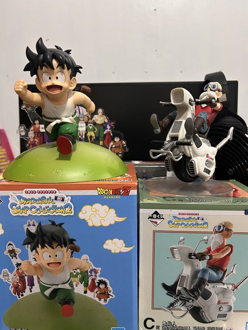 Ichiban Kuji Dragon Ball Snap Collection 2 Figures (Category: Figurines & Statues) located in Victoria. Submitted by pisangpaulotoys (Listing ID 1470525665, Image 3). Description: - Authentic Ichiban Kuji Dragon Ball Snap Collection 2 figures - Includes C Prize: Master Roshi on scooter - Includes D Prize: Kid Gohan running - Both items come with original boxes - Clean and well-kept condition - Perfect addition to any Dragon Ball collection.