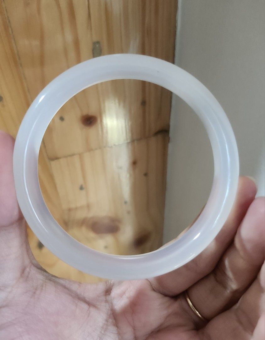 Icy White Agate Bangle 57.7mm (Category: Bracelets) located in Baguio. Submitted by lausgem2026 (Listing ID 1470358341, Image 1). Description: -An icy white agate bangle with minimal inclusions/bandings typically seen in agate. -57.7mm diameter size. 11.5mm thickness. -Comes with free box but no certificate. -Location: Baguio City.