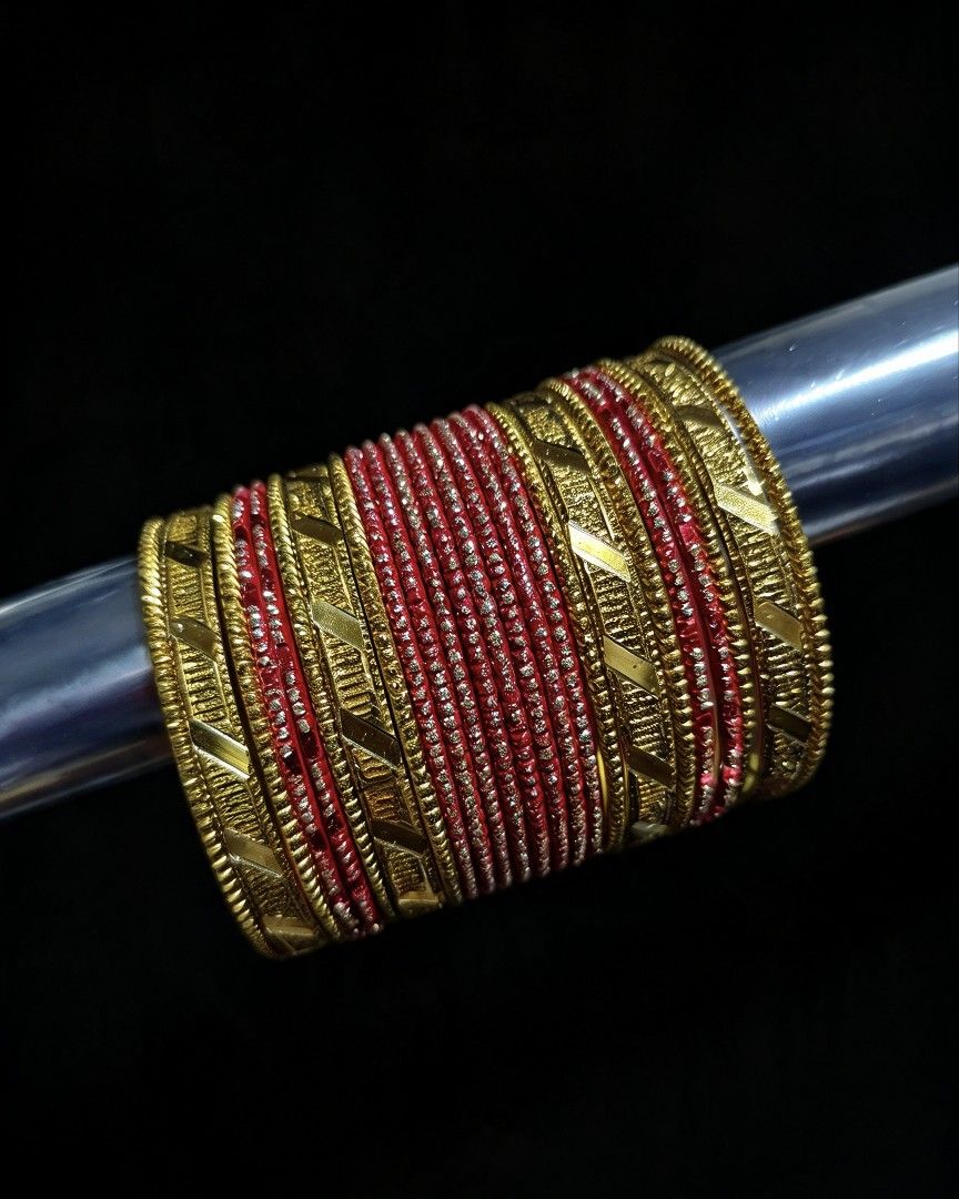 Indian Bangles Red and Gold Sale (Category: Bracelets) located in Makati City. Submitted by khrizaccessories (Listing ID 1470487481, Image 2). Description: made in india Bollywood traditional bangles also available in black/gold and orange/gold glittery shine shake the bangles before using to remove excess glitters.