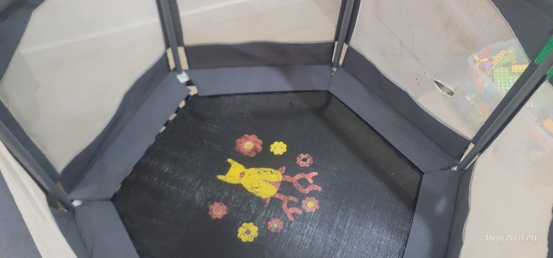 Indoor Kids Trampoline with Enclosure Net (Category: Infant Playtime) located in Paranaque City. Submitted by silverphoenix.00302e (Listing ID 1470434217, Image 1). Description: - Kids indoor hexagon trampoline with safety enclosure net - Fun flower and bug print jumping mat with zipped mesh doorway - Sturdy metal frame with grey fabric padding for safety - Excellent indoor energy burner for toddlers and young children - Condition: Used with some