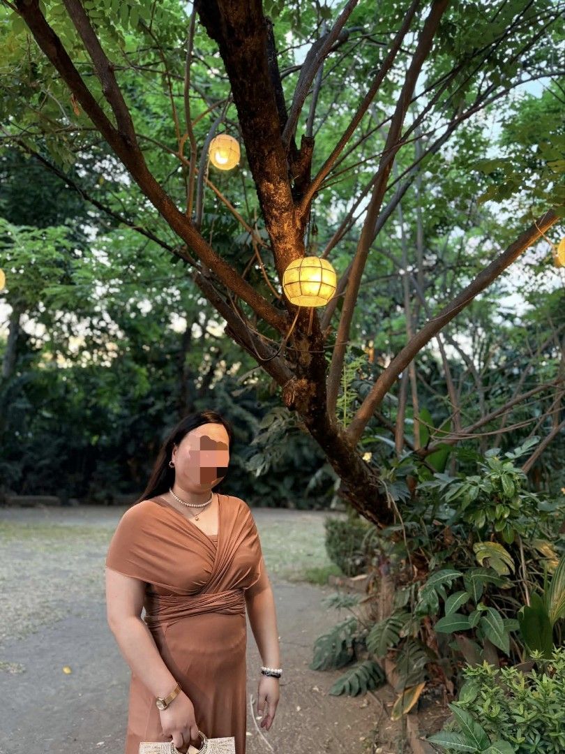 Infinity dress brown cotton FREE SIZE (Category: Dresses) located in Taguig. Submitted by marj.palomo (Listing ID 1470471247, Image 3). Description: - Color: Brown - Material: Comfortable cotton - Size: Fits small to large frames - Style: Versatile multiway wrap maxi dress with flowing skirt - Inclusion: Comes with a matching tube top modesty piece - Perfect for: Bridesmaids, formal events, and special occasions - Easy to adjust and style in mult