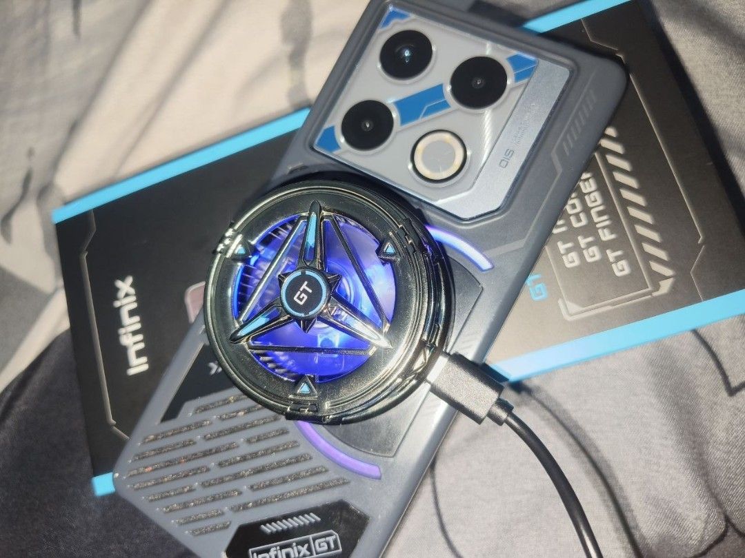 INFINIX GT20 PRO + GAMING KIT (Category: Android Others) located in Caloocan City. Submitted by shawnqt (Listing ID 1470471763, Image 2). Description: Infinix gt20 pro Issue minimal dents and scratches normal for second hand With original charger and gaming kit price are negotiable..