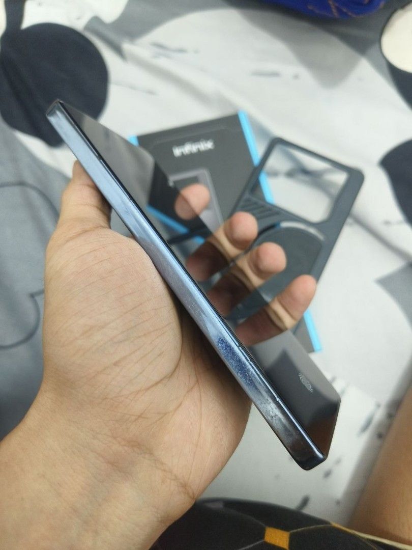 INFINIX GT20 PRO + GAMING KIT (Category: Android Others) located in Caloocan City. Submitted by shawnqt (Listing ID 1470471763, Image 3). Description: Infinix gt20 pro Issue minimal dents and scratches normal for second hand With original charger and gaming kit price are negotiable..