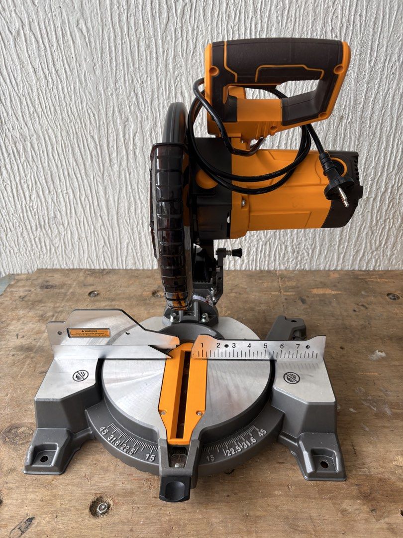 Ingco 1800W Mitre Saw (Category: Construction Tools & Equipment) located in Paranaque City. Submitted by famstrei1975 (Listing ID 1470352028, Image 1). Description: - Brand: Ingco - Power: 1800W motor for precise and easy cutting - Features: Adjustable bevel and mitre settings on a sturdy metal base - Condition: Great working condition, includes original retail box - Plug: Standard power plug attached, ready for immediate workshop use - Ideal for