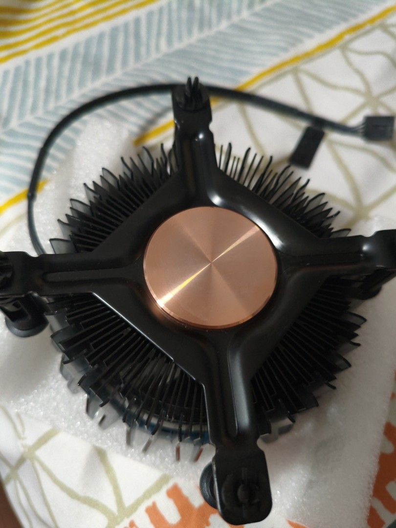 Intel Laminar stock cooler (Category: Computer Parts) located in Pasig City. Submitted by garage.sale89 (Listing ID 1470476491, Image 3). Description: - Pulled from a brand new AMD processor build - Copper base for superior heat dissipation - Clean aluminum fins with zero dust buildup - Standard black fan shroud with push-pin mounting brackets - Attached 4-pin PWM fan connector cable - Ready for quick and easy motherboard installation.