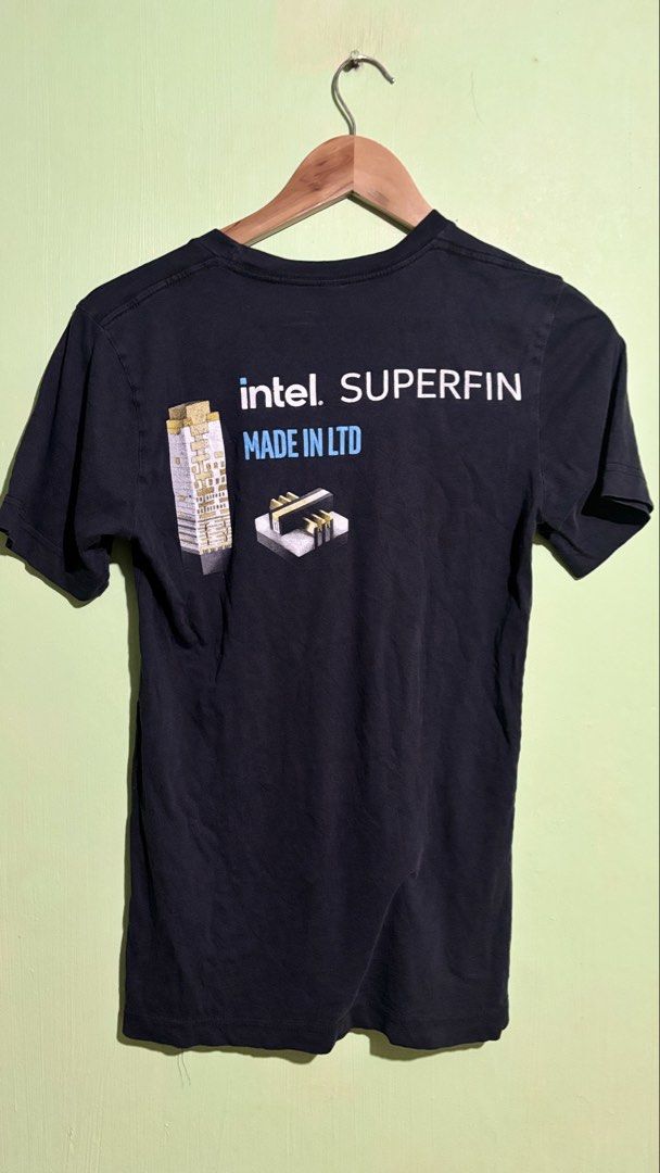 Intel Logic Technology Development 10nm SuperFin T-Shirt (Category: Tshirts & Polo Shirts ) located in Baguio. Submitted by iconicsmeti (Listing ID 1470503644, Image 3). Description: - Brand: Bella + Canvas - Size: XS - Material: 100% cotton - Color: Black - Design: Intel logo on front, microarchitecture graphic and "Made in LTD" text on back - Condition: Standard employee/tech event merch, great for chip collectors and tech enthusiasts hairline 
