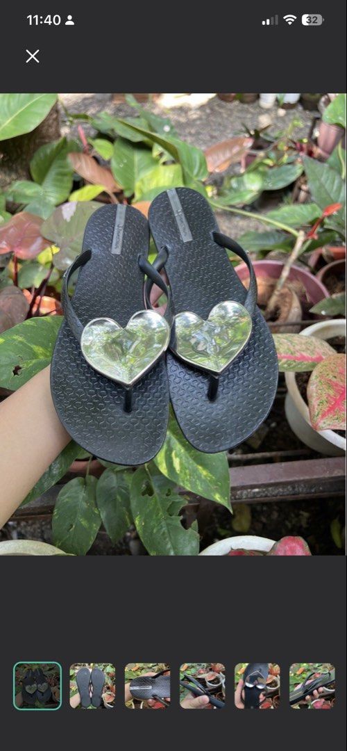 Ipanema Black Flip Flops with Silver Heart (Category: Slippers and slides) located in Manila. Submitted by dyvmx949t543465 (Listing ID 1470409638, Image 1). Description: - Brand: Ipanema (Made in Brazil by Grendene) - Color: Black with a shiny silver heart charm on the straps - Size: 8 USA / 37 BRA / 39 EUR - Material: Comfortable, high-quality rubber with a textured footbed for anti-slip grip - Style: Easy slip-on, perfect for casual days out an