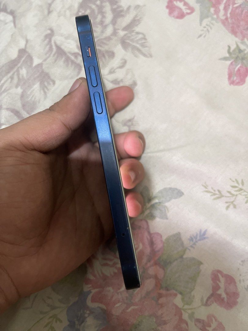 iPhone 12 256GB BLUE DUALSIM (Category: iPhone 12 Series) located in Pasig City. Submitted by marcrafael (Listing ID 1469135123, Image 3). Description: iPhone 12 256GB FU physical dualsim Selling price: 14500 NEGOTIABLE SWAP TO YOUR? ADD KA CASH Details: 95% battery health Face ID and truetone working Physical dualsim any network pwede No repair history no icloud issue Package? Unit case only! Issue? May dent lang sa lower part Please note mas ma