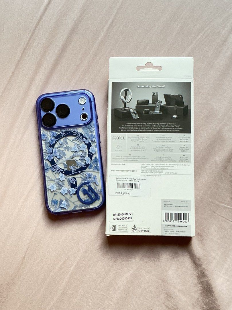 iphone 18/17 pro Spigen Magsafe case (Category: Cases & Sleeves) located in Manila. Submitted by mcpmcp (Listing ID 1470443254, Image 2). Description: Used for 2 days only. Bought from Spigen SM MOA. Strong magsafe. Flower design is 3D printed. Very beautiful in actual. Drop protection up to 6ft; camera plateau is covered as well so well protected. Color: Indigo/Violet/Violet-Blue No scratches. No damage. RFS: extra case. Full payment via gcash. 