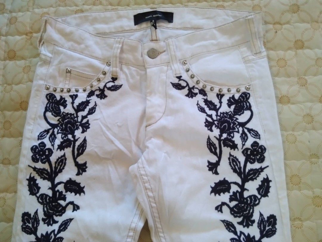 Isabel Marant Jeans Embroidered (Category: Jeans) located in Zamboanga. Submitted by nurbya898048 (Listing ID 1470400160, Image 2). Description: This is a Isabel Marant Dwnim Jeans Gallo Embroidered. With a classic 5 pocket, Styling relaxed. Dimensions; Tag size 36 Waist 28-29 Length 39 Hem 6 In White denim Jeans Good to excellent Check all photos for details 2500+shipping fee.